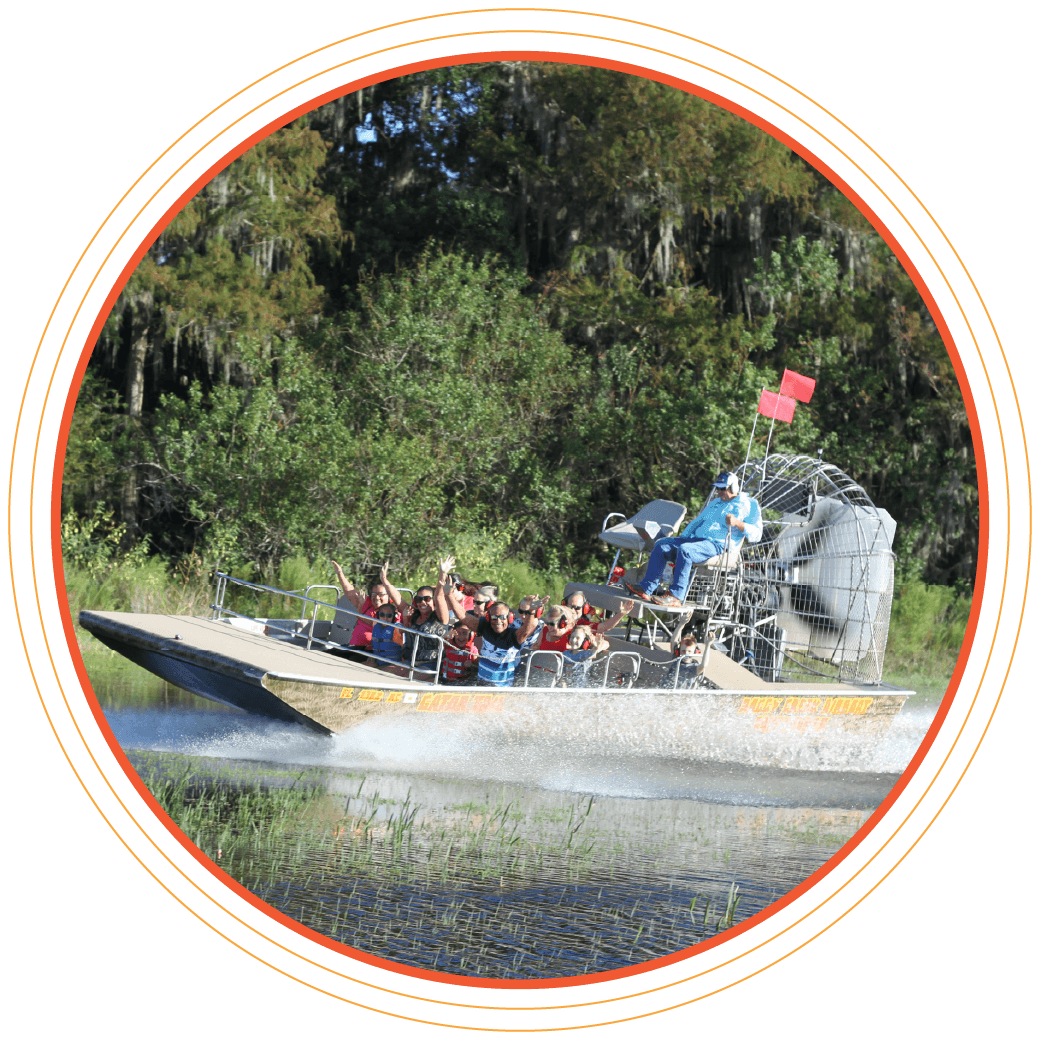 Photo of people riding an airboat